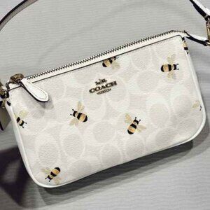 Coach nolita 19 in signature canvas with bee print